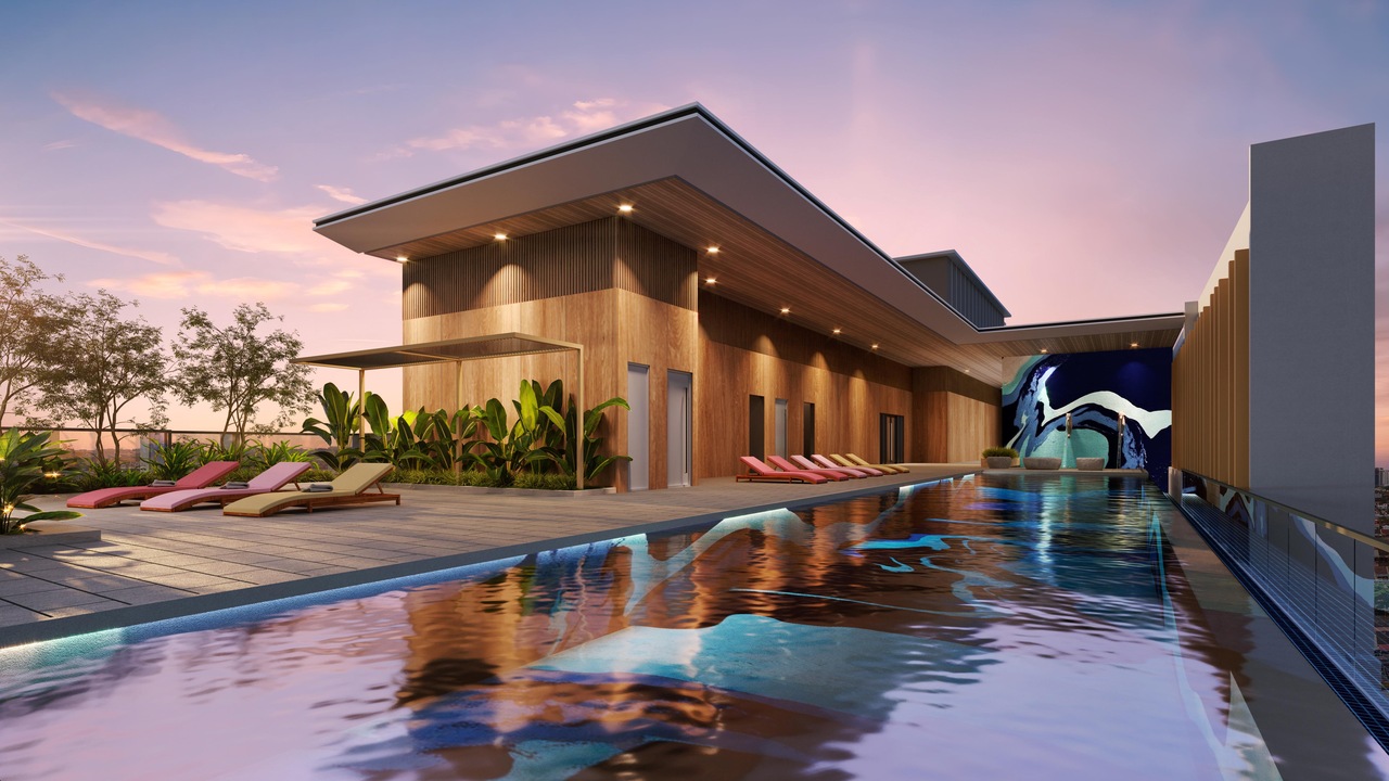 Wavescape infinity pool at Axis Tower, Causewayz Square @ JBCC, featuring a rooftop leisure deck with poolside lounge spaces.